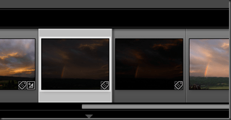 Two frames showing very underexposed view where you can just see a rainbox